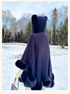 Women winter warm hooded cape cloak with luxurious faux fur trim, elegant outerwear coat.