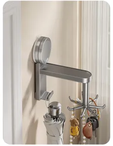 Wall-mounted rotating hook detail, multi-functional key holder and organizer for home decor.