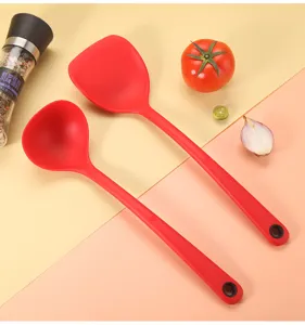 Red silicone spatula and soup ladle set, heat resistant kitchen utensils for cooking.