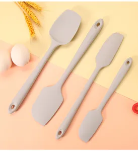 Silicone spatula set details, heat resistant baking tools for cream and flour mixing.