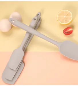 Silicone spatula set detail view, seamless heat-resistant scrapers for baking, grey color.