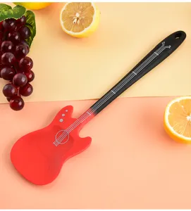 Creative guitar shaped silicone spatula for baking and cooking non-stick pan tool detail view.