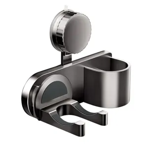 Wall mounted suction hair dryer holder bathroom organizer rack with storage cup and cord wrap.