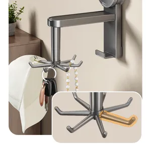 Detail view of rotating wall hook for keys and jewelry storage. Durable metal rack.