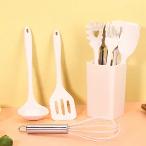 Mini ensemble d'ustensiles de cuisine en silicone avec support résistants à la chaleur.