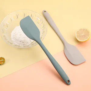 Spatola in silicone per uso alimentare resistente al calore per cottura e miscelazione.