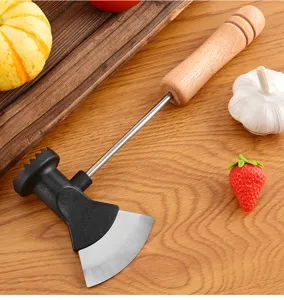 Stainless steel meat tenderizer detail view, showing durable axe blade and ergonomic wooden handle.