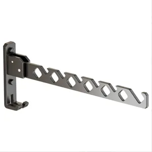 Wall-mounted foldable clothes drying rack, punch-free metal hanger for indoor balcony use.