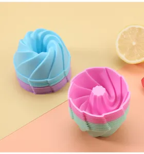 Silicone bundt cake mold detail showing the spiral texture and bright pastel colors.