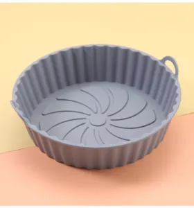 Round silicone air fryer pot detail view, non-stick baking mat liner for oven cooking use.