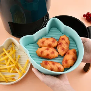 Silicone air fryer pot with cute cat ear design and 3d oil drainage bottom for baking.