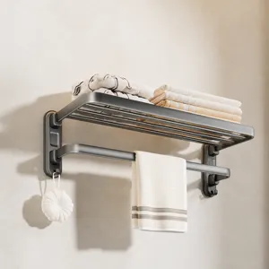 Wall mounted bathroom towel rack, punch free metal shelf with hooks for home storage.