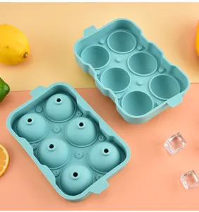 6-cavity silicone ice ball mold for whiskey, flexible tray maker for home kitchen ice cubes.