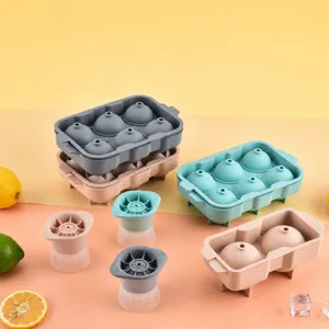 Silicone ice ball mold tray for whiskey and cocktails, flexible and easy release ice maker.