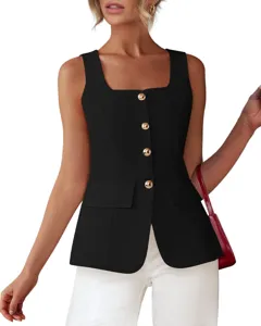 Detail view of black sleeveless blazer vest showing square neckline and gold buttons.
