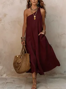 Chic one-shoulder sleeveless midi dress in deep burgundy, perfect for elegant resort vacations.
