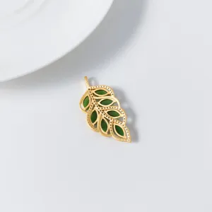 Detail shot of the exquisite green jade leaf pendant showcasing fine S925 silver metalwork.