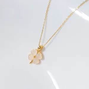 S925 silver white jade four leaf clover pendant necklace detail view showcasing craft.