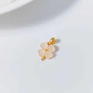 Detail close up view of S925 silver white jade four leaf clover pendant jewelries