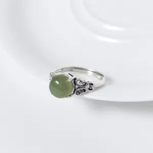 S925 sterling silver retro green jade ring with intricate Thai silver floral design for women