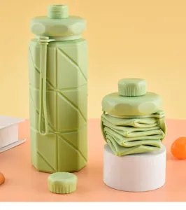 Collapsible silicone water bottle detail showing folded and expanded state for travel.