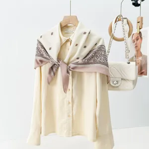 Luxury printed silk scarf and classic long sleeve blouse set for women fashion styling.