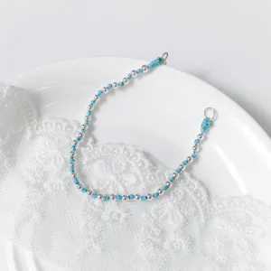 Detailaufnahme des S925 Silberperlen und blauen Kordel Armbands, elegantes Design.