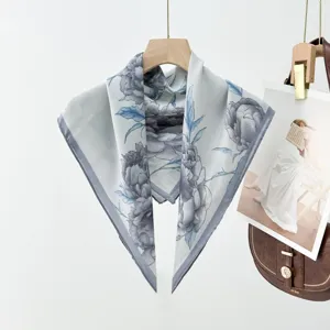 Detailed view of the floral silk scarf, elegant grey blue square neckerchief, vintage floral design
