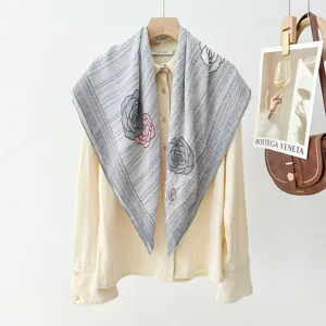 Retro printed silk scarf featuring elegant floral patchwork, perfect for spring and summer wear.