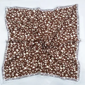 Brown floral square scarf featuring delicate white lace trim, elegant design for women style.