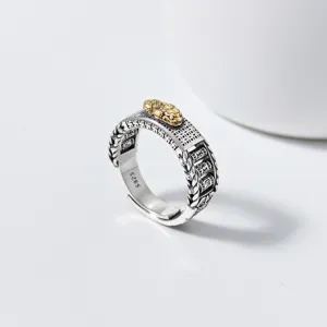 Detailed shot of S925 silver retro Chinese style Pixiu rotating mantra ring jewelry.