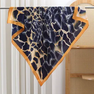 Blue geometric printed square silk scarf with vibrant orange border elegant fashion accessory