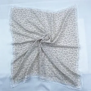 Ditsy floral square scarf with delicate white lace trim detail, lightweight fabric for summer.