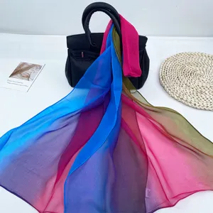 Detailed view of a vibrant rainbow gradient silk scarf, lightweight and breathable shawl.