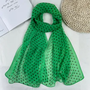 Summer green polka dot georgette scarf, stylish lightweight travel sun protection accessory.