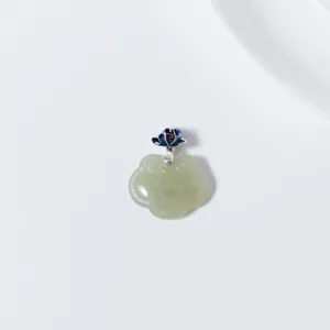 Close-up detail of S925 silver Hetian jade lotus ruyi pendant with blue enamel, elegant jewelry.