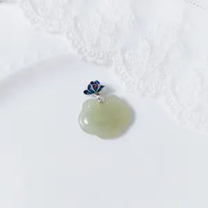 Exquisite S925 silver Hetian jade lotus ruyi pendant detail showcasing delicate craftsmanship.