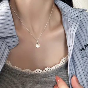Élégante collier pendentif rond minimaliste en argent S925 pour femmes bijoux mode.