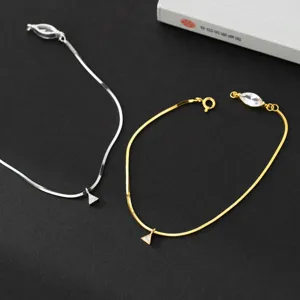S925 silver snake bone bracelet with delicate triangular crystal pendant, luxury style jewelry.