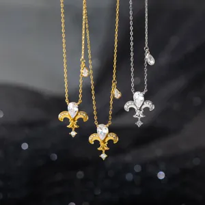 Stunning close-up detail shot of the luxury vintage silver and gold necklaces with gems.