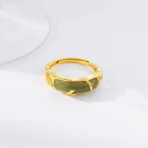 Exquisite S925 silver green jade bamboo ring, elegant neo-chinese vintage style detail shot.