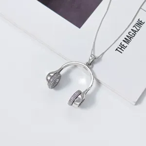 Stunning S925 silver headphone pendant necklace with sparkling purple details for daily chic style.