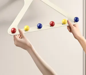 Multicolor wooden ball coat rack for door or wall mounting, sturdy hook with vibrant spheres.