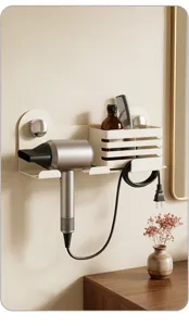 Detail shot of wall-mounted hair dryer holder with storage basket and cord organizer rack.