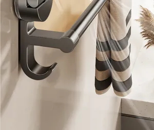 Bathroom suction towel bar detail view showing durable dark gray metal finish and hanging hook.