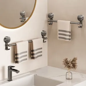 Bathroom suction cup towel bar, punch-free metal towel rack with hooks for modern washroom.