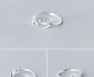 Silver deer antler branch ring detail view, adjustable open band, sweet minimalist jewelry style.