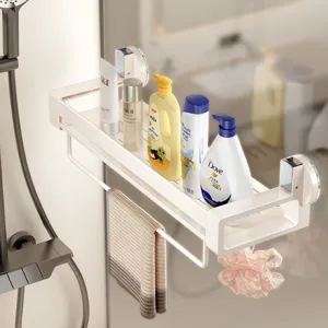 Bathroom suction cup storage shelf punch-free wall-mounted rack with towel bar and hook.