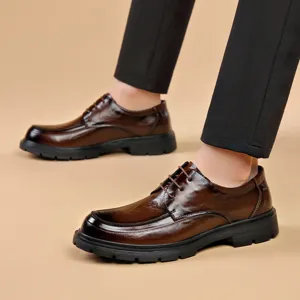 Men's brown leather dress shoes, business casual formal footwear with lace-up design and thick sole.