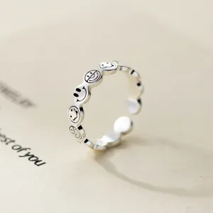S925 sterling silver vintage smiley face ring, minimalist fashion index finger jewelry detail.